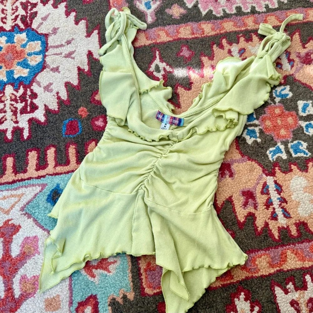 Green Ruffled Sleeveless Top - Picture 1 of 3